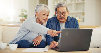 couple looking at computer sreen